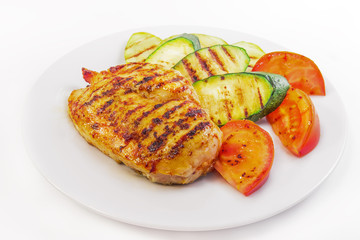 dish is chicken steak with vegetables