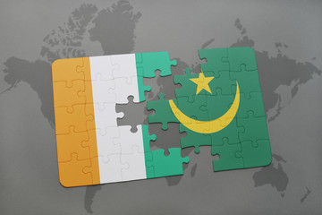puzzle with the national flag of cote divoire and mauritania on a world map
