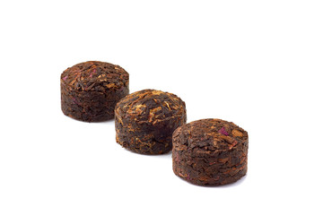 Chinese fermented Puer tea on white