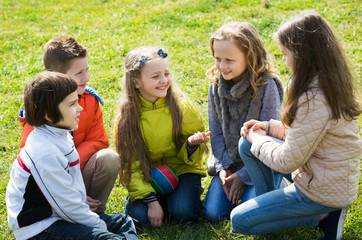 Fototapeta premium Kids chatting outdoor