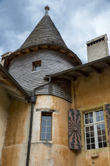 Fototapeta na wymiar mountain village of Romainmotier-Envy, old medieval house with tower - Switzerland