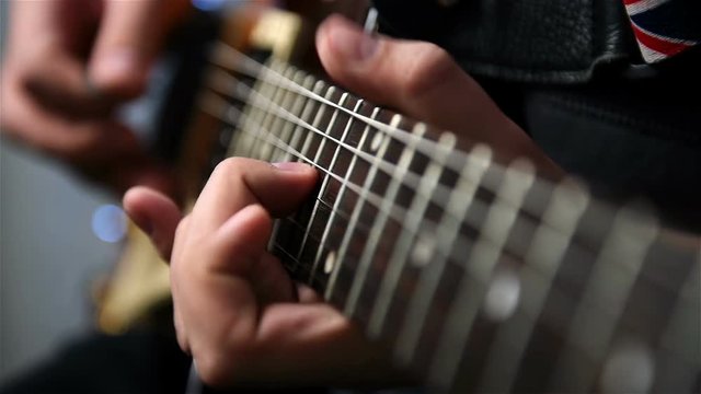 Guitarist Playing Guitar Solo An Guitar. Slow Motion Effect