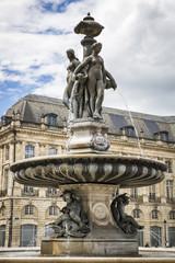 Fountain with statues of the three Graces place de la Bourse, Bordeaux, France