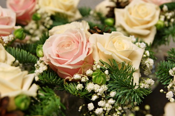 Christmas decoration with spruce branches and roses