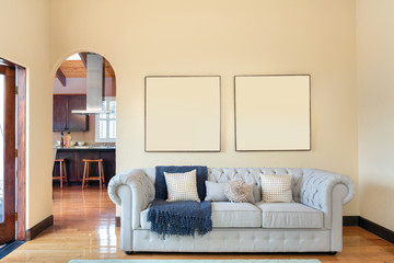 Interior design of couch on a beige wall with copy space