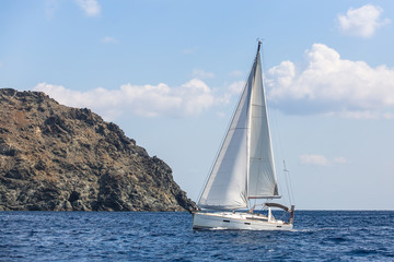 Fototapeta na wymiar Boats in sailing regatta at Aegean Sea. Luxury yachts.