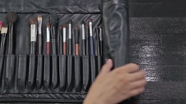 Closeup of professional cosmetics makeup brushes kit
