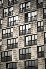 Obraz premium close-up on facade of a modern flat residential buildings with windows