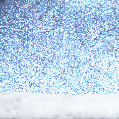 snow flakes on bottom side, abstract fall of snow and blue colored background