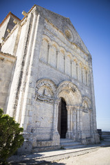Obraz premium front facade of Sainte-Radegonde medieval Church, Talmont sur Gironde, Charente Maritime, France