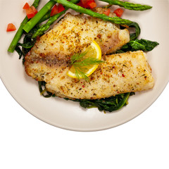 Baked Whitefish Tilapia Fish Fillet Isolated on White. Selective focus.