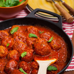 Meatballs in tomato sauce. Selective focus.