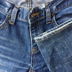 Denim jeans texture or denim jeans background with old torn.
