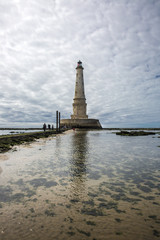 view of the historical lighthouse of Cordouan at low tide, Gironde estuary, France