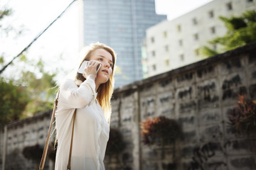 Fototapeta premium Casual Cheerful Girl Alone Outdoor Recreation Concept