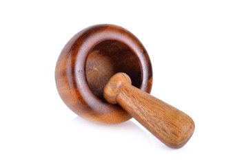 wooden mortar with pestle on white background