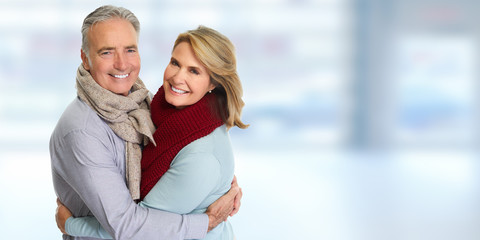 Senior couple smiling.