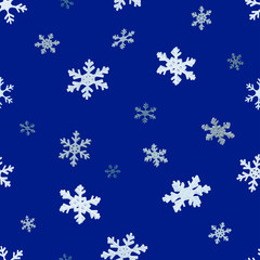 The falling snowflakes. Seamless background