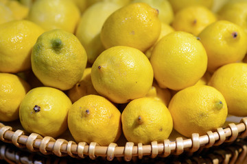 Lemons in basket at market