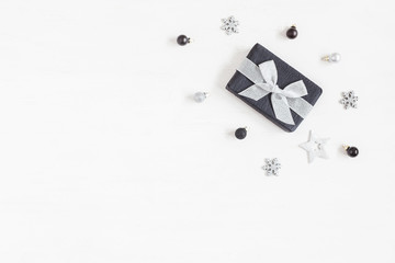 Christmas composition. Christmas gift, snowflakes, pine cones. Top view, flat lay