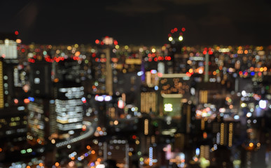 Fototapeta na wymiar Aerial view of cityscape - defocused night lights