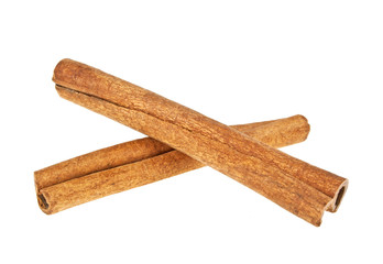 Two cinnamon sticks isolated on white background