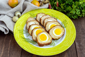 Meatloaf stuffed with boiled eggs, sliced. Close-up.