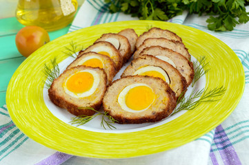 Meatloaf stuffed with boiled eggs, sliced. Close up