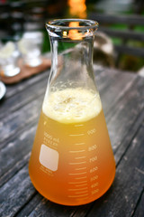 Gradient effect on fruit juice cocktail in a transparent beaker