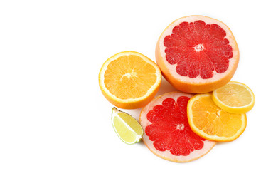 A variety of fresh citrus fruits isolated on white background