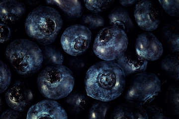 pile of ripe blueberries closeup background