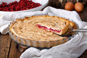 Homemade cowberry tart with merengue.