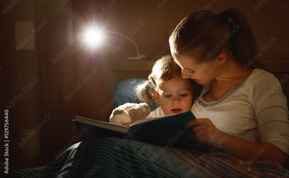 Sticker mother and child girl reading a book in bed