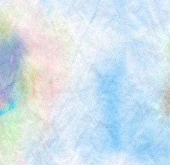 Abstract watercolor background on creased paper texture 
