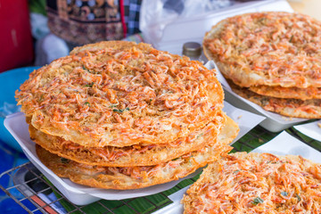 Snack crispy shrim on street market in Thailand