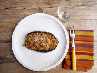 Stuffed eggplant in a white dish
