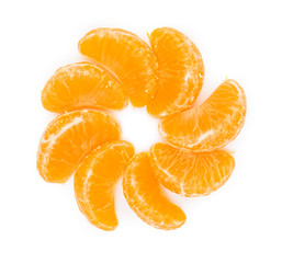 Pieces of orange tangerine or mandarin in sun form isolated