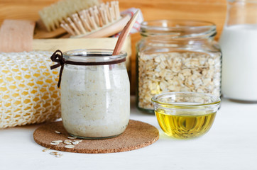 Homemade oatmeal mask in a glass jar. Gentle scrub for sensitive skin. Diy cosmetics. 