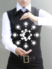 businesswoman pressing a business network earth icon on virtual screen. Businessman toched social network button on touch screen. Communication, connection, networking, communion, global technology.