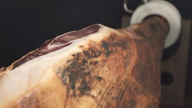 Sliding camera over serrano ham leg