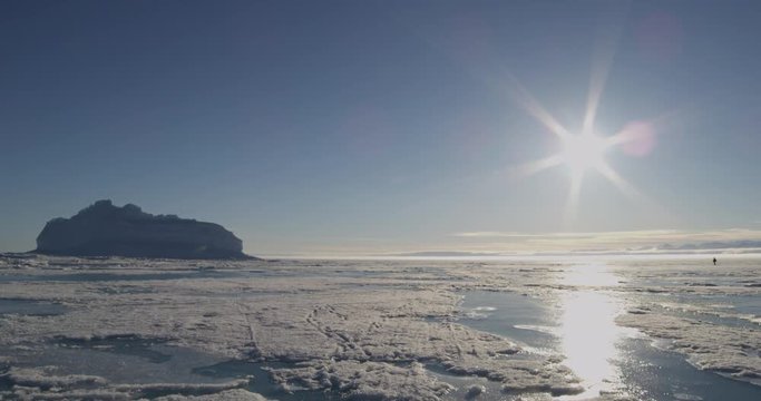 Pan of ice mountain on sunny day
