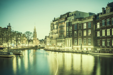 Vintage Cityscape with Night Lights in Amsterdam