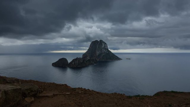 Dark clouds over The Magic Island, Es Vedra, Ibiza
