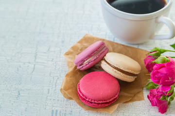 Morning coffee with flowers and macaroons. Mather's day  Valentine'  concept.