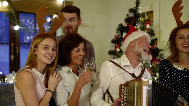 Beautiful big family celebrating Christmas together