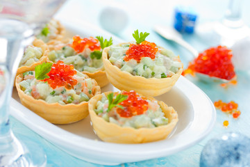 Christmas festive appetizer tartlets stuffed with salmon salad a