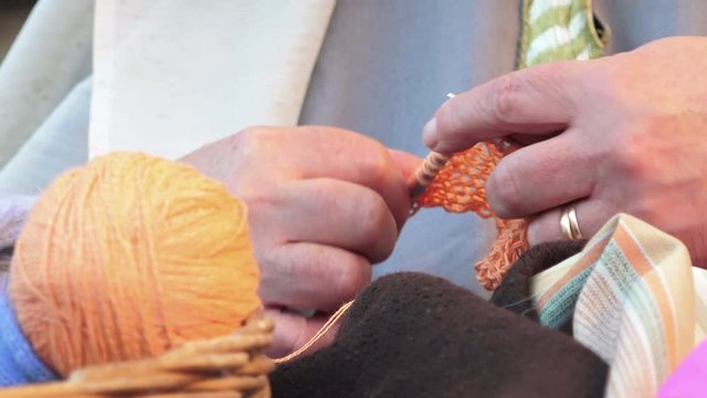 old woman knitting