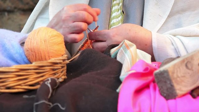 old woman knitting