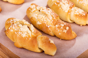 Homemade cakes, sweet croissants, closeup.