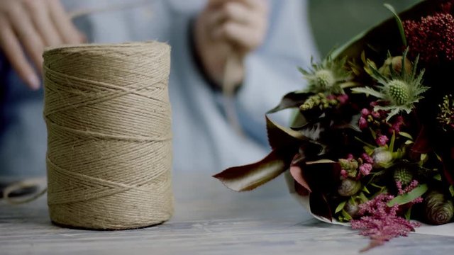 skein of twine and flowers